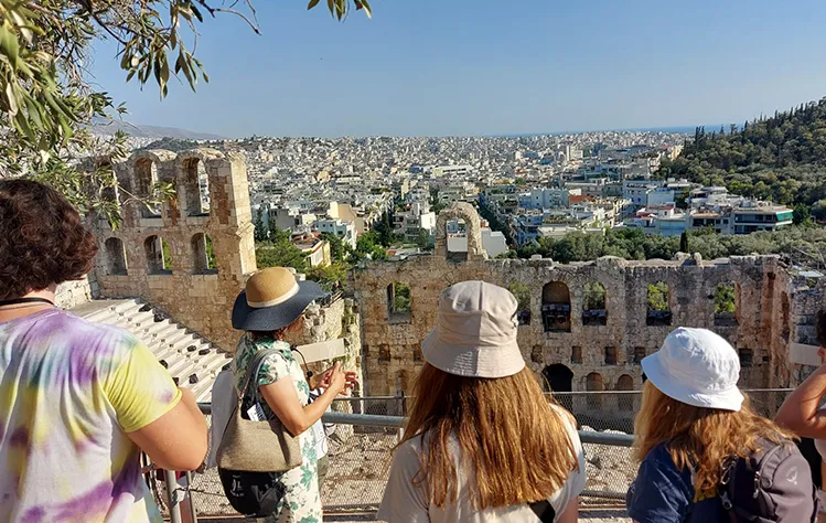 students gaze at the view of Athens