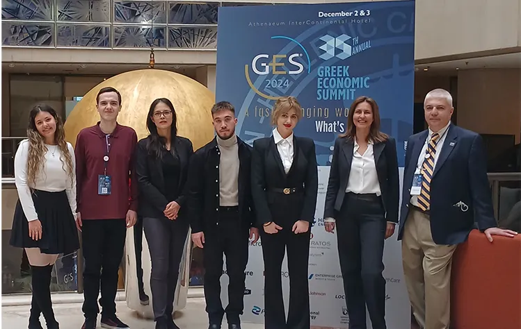 students posing for photo at the greek economic summit